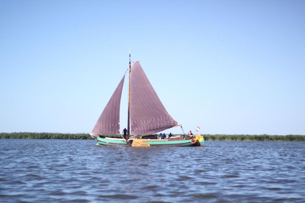 Sailing on a flatboat (Skûtsje)